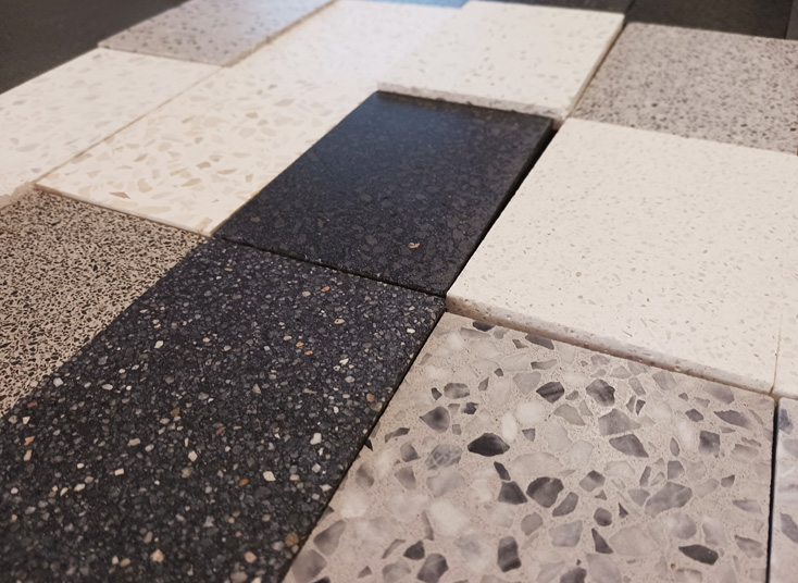 Concria Optimal Slab Deco color samples including pure white, gray, and black terrazzo options