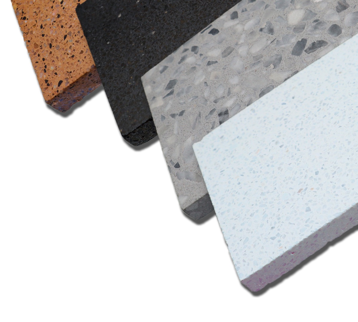 Concria color range — white, gray, black, and earth tone terrazzo concrete samples